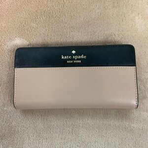 NWT Kate Spade Large Slim Bifold Wallet. Tan and Black with Gold Accents.